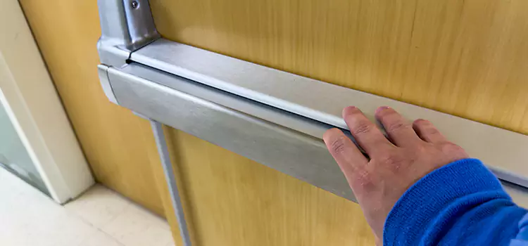 Installing a Push Bar on a Door Florin